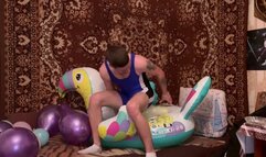 Wrestler Jason pops balloons on a toucan