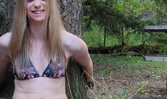 Fetishguy captures the evil tickler Nina Luck ties her to a tree and tickles her feet in a set of Foot stocks without any mercy