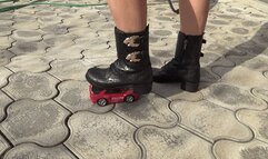 Crushed a toy car with black boots TYC