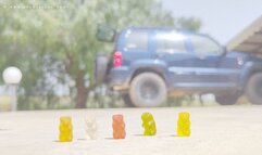 Giantess and gummy bears specks under her feet