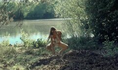 Honour May collect firewood in her diaper