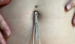 girl with piercing inflates circle and dolphin