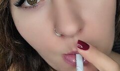 Face close up (sensual smoking) and eye contact