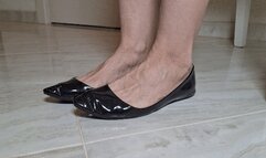 Toe wiggling in patent leather black ballet flats 8