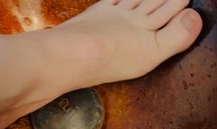Nefariess washes her feet and clips and paints her toenails