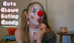 Cute Clown In A Cozy Sweater Eating Candy