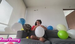 Akina blowing balloons in bikini