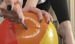 Heels, bare feet, pen ruin your beach balls