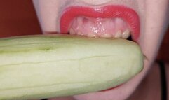 chewing and eating a cucumber