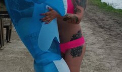 deflate inflatable whale on beach