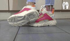 Testing her new Buffalos Sneakers floor view