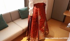 Chinese girl wearing ancient horse-faced skirt being tickled - cotton socks bare feet