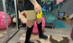 poping balloons in boots