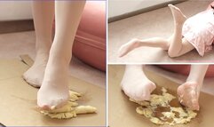 The girl wears pink stockings to show you, and finally crushes the banana into mud