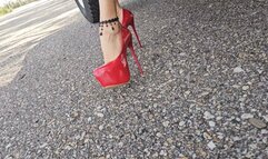 Katherine driving a classic Toyota Land Cruiser 1977 on sexy red platform heels