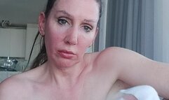 Stevie sneezes on her feet as she scrunches them and removes her socks