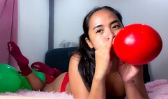 Sexy Stella Blows Up Then Pops Your Smaller Green And Red Christmas Balloons