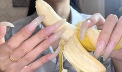 #127 - Long clear nails on banana