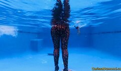 Carissa in the cougar catsuit underwater with scooter addition
