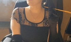 Faith smoking with cigarette holder and opera gloves