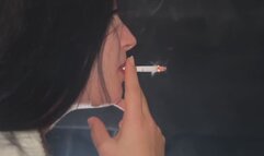 SMOKING SANDY NOSE EXHALES CLOSE UP