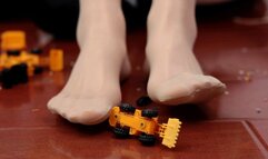 GTS - Giantess plays with toy figurine on boots, smothers them in shoes with smelly stockings