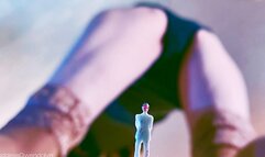 Giggling giantess with long legs farted at a tiny boyfriend