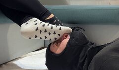 Her Footrest Smells Her Feet While She Relaxes