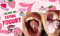 Close up eating yogurt