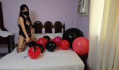 Dominatrix punishes balloons
