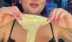 Val in black lingerie poping balloons