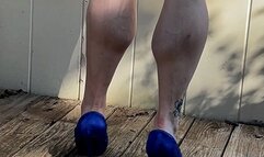 Jazzy on her deck, posing her muscular calves