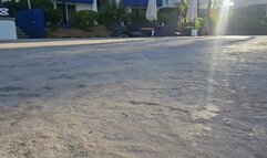 Milah Arches walking around the pool on sexy flip flops