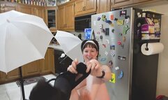 Woman dressing into shirt and tie and shorts