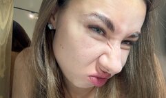 The girl tries to touch her nose with her lip, wrinkles her nose (custom video) part 2