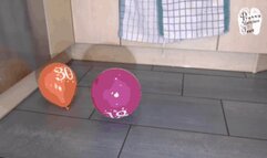 Balloons and water balls under nylon feet