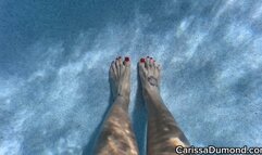 Carissa underwater in the hibiscus bikini with pedicured toes and wrinkled soles