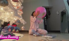 Akina plays with 3 beach balls in the middle of the night