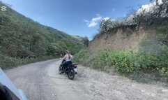 Jarlyn drives the motorcycle in the unstable terrain