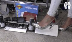 Electronic devices crushed under metal Heels