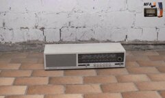 Transistor Radio under my strong Wellies