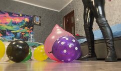in latex and boots poping balloons
