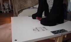 Hardcore cock trampling against the table in my boots