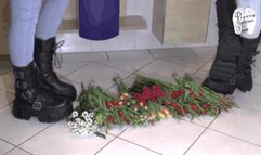 Flowers under cruel Boots