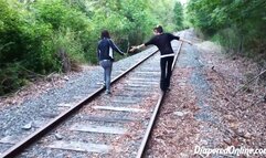 Mia & Taylor: Playing on Train Tracks