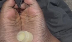 Feet fetish lotion on feet