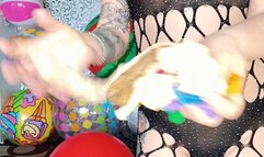 Val looner play with big long balloons