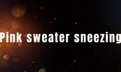 Pink sweater sneezing
