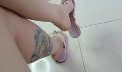 Flip-flops hanging from Tami's pronounced arches (4)