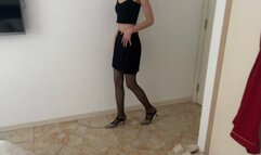 The girl came home from a walk and finally can take off the shoes she was given and stretch her feet, tickle them and play with a rubber dick